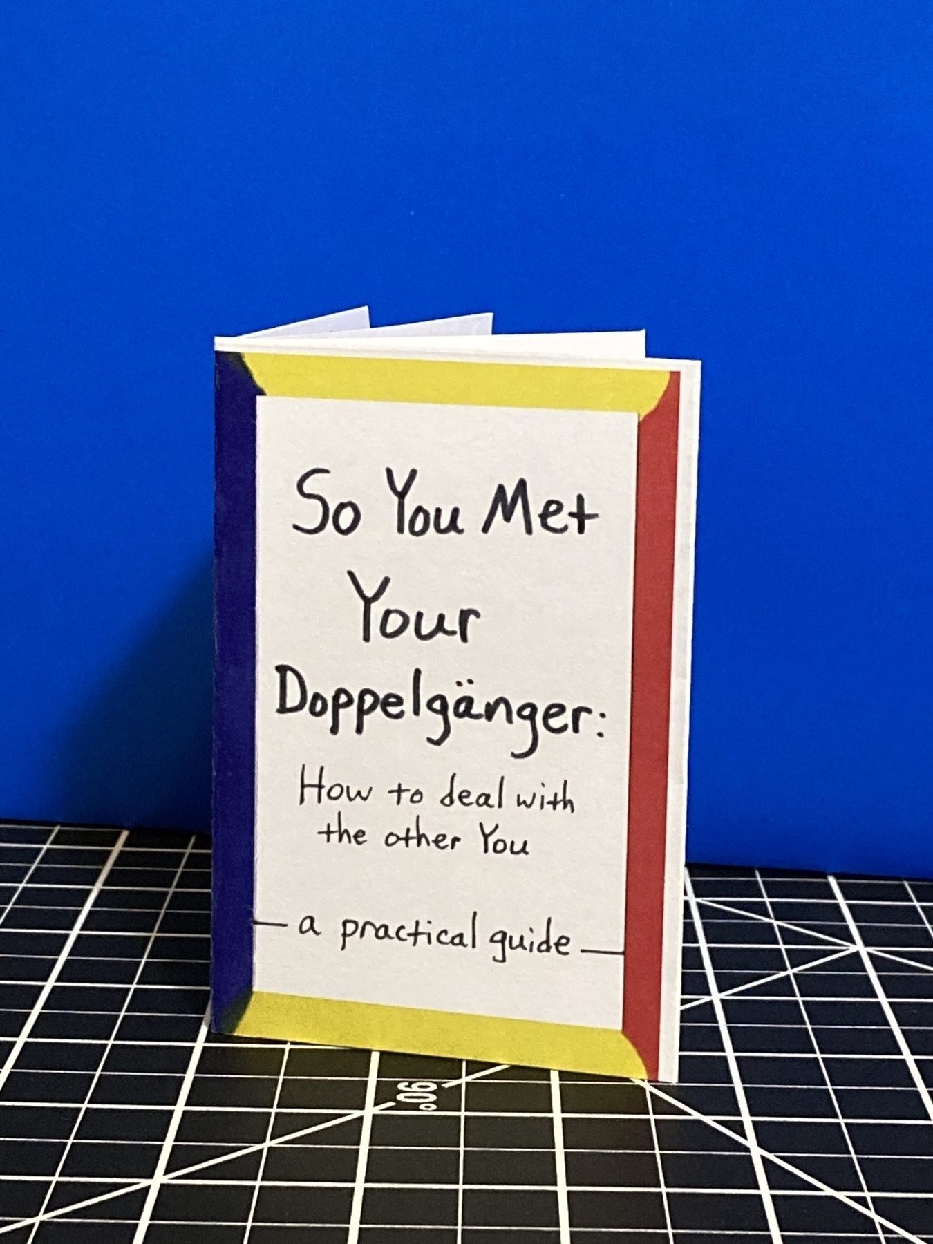 The cover of a mini zine titled So You Met Your Doppelgänger.